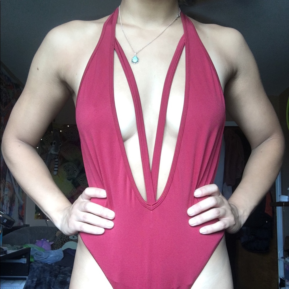 Red strappy one piece bodysuit